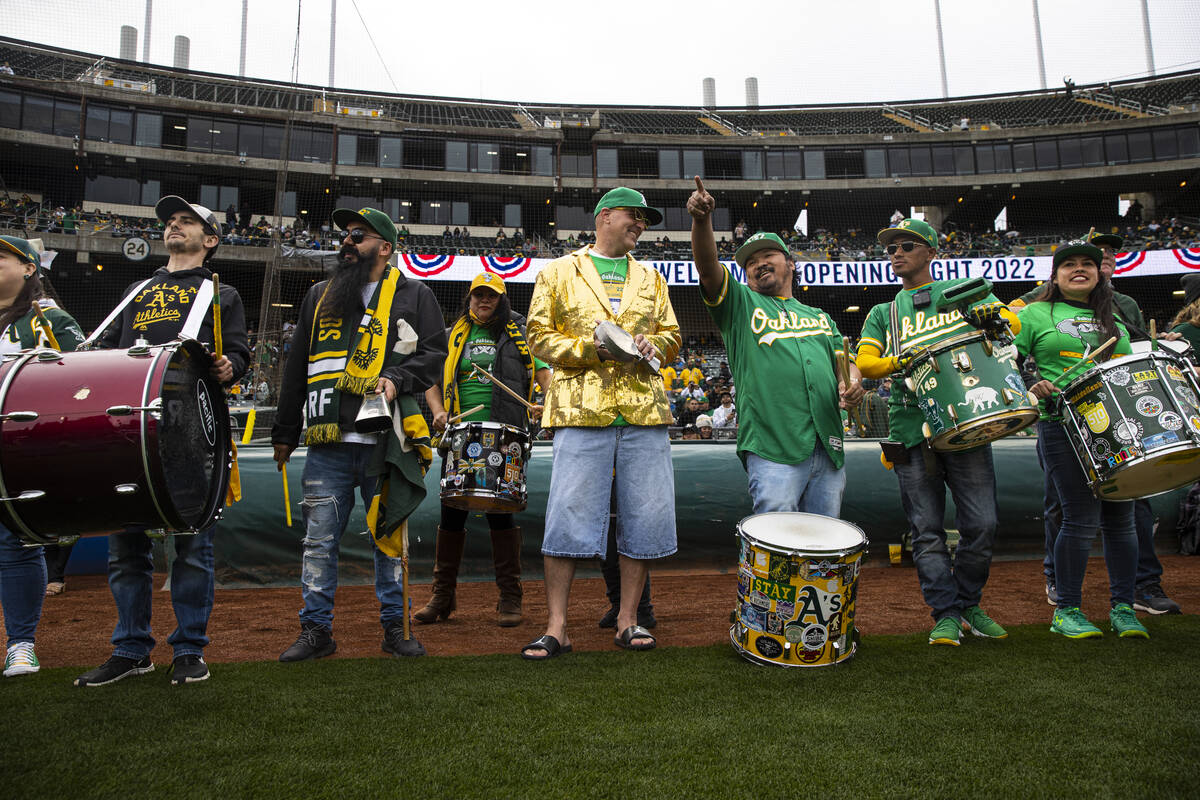 Oakland Athletics fans cheer before the opening night game against the Baltimore Orioles on Mon ...