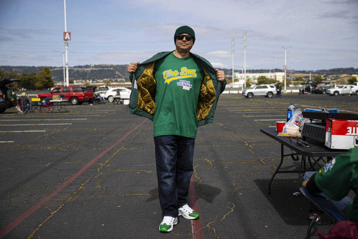 Mario Cruz, of Modesto, Calif., poses for a picture before the opening night game against the B ...