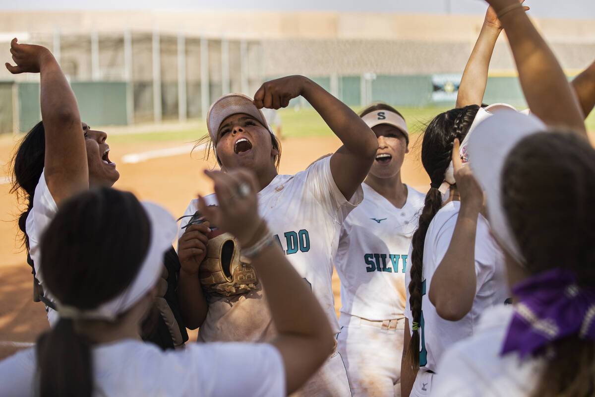 Silverado players celebrate a big offensive inning during a girls high school softball game aga ...