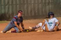 Silverado’s Savanna Johnson (17) slides in safe past Cimarron-Memorial’s Julianne ...