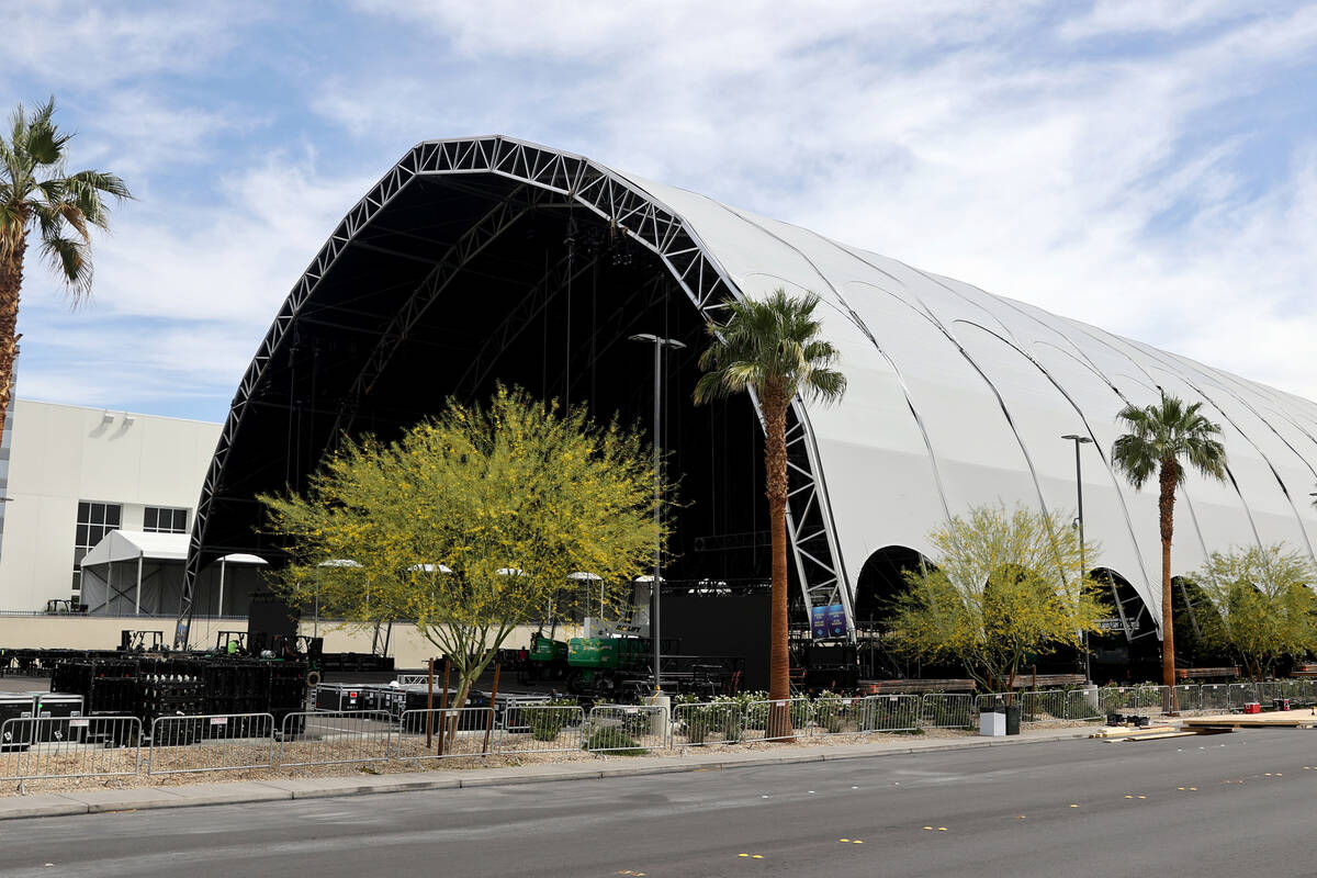 The main stage at the NFL Draft Experience under construction behind The Linq Hotel in Las Vega ...