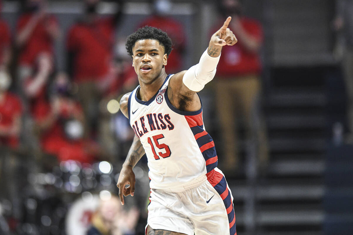 Mississippi forward Luis Rodriguez (15) reacts after his three-point basket against Auburn duri ...