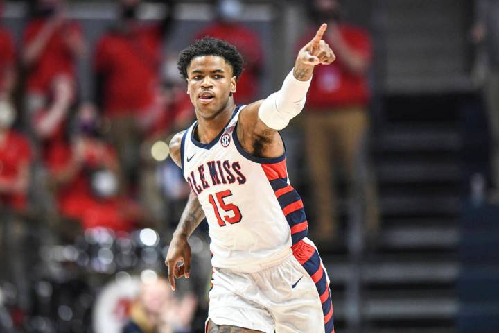 Mississippi forward Luis Rodriguez (15) reacts after his three-point basket against Auburn duri ...