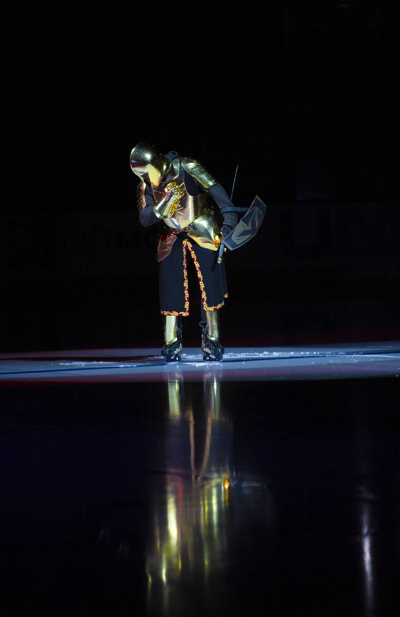 The Golden Knight salutes the crowd before the start an NHL hockey game against the Washington ...