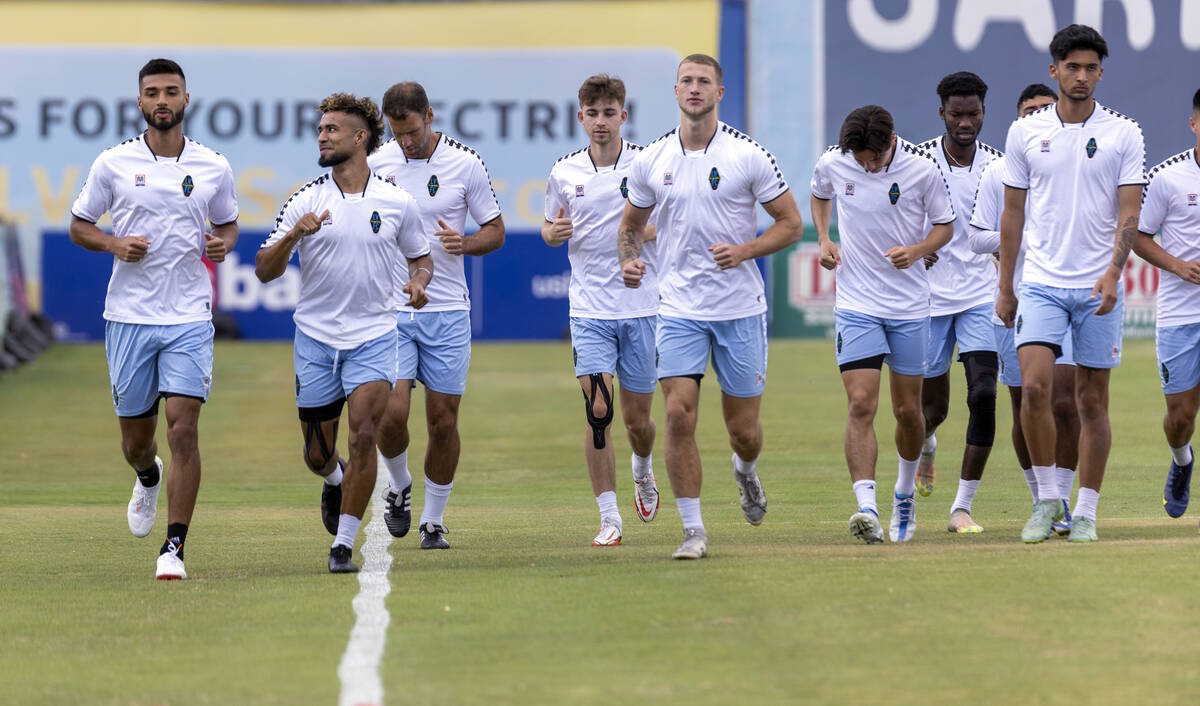 Lights FC standout Danny Trejo, second from left, runs laps with teammates during practice at C ...