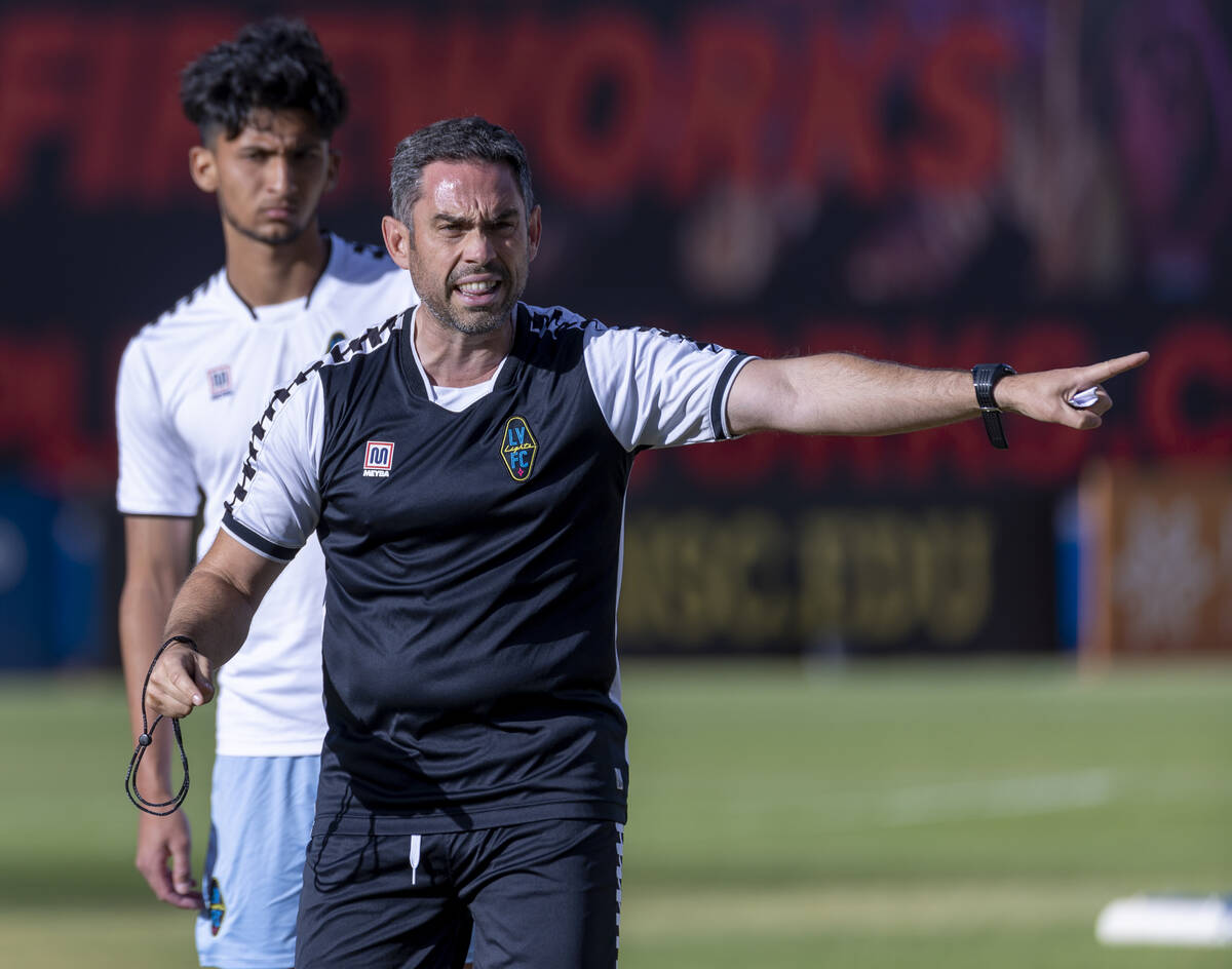 Lights FC head coach Enrique Duran motivates his players during practice at Cashman Field on Fr ...