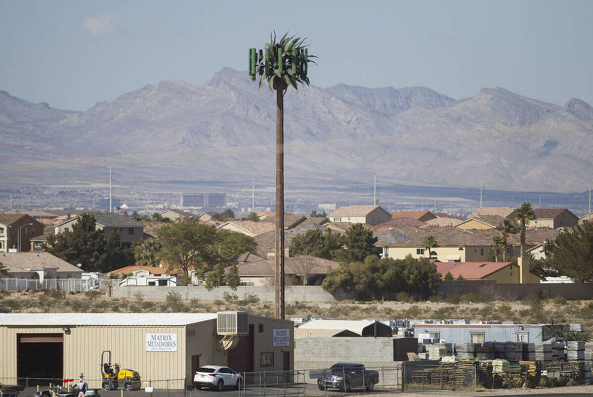A Verizon cell tower is seen near the intersection of W. Pebble Road and W. Torino Avenue in La ...