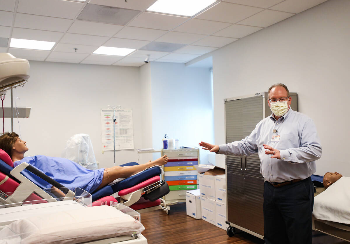 Gordon Absher, external communications manager for Dignity Health St. Rose Dominican, points ou ...