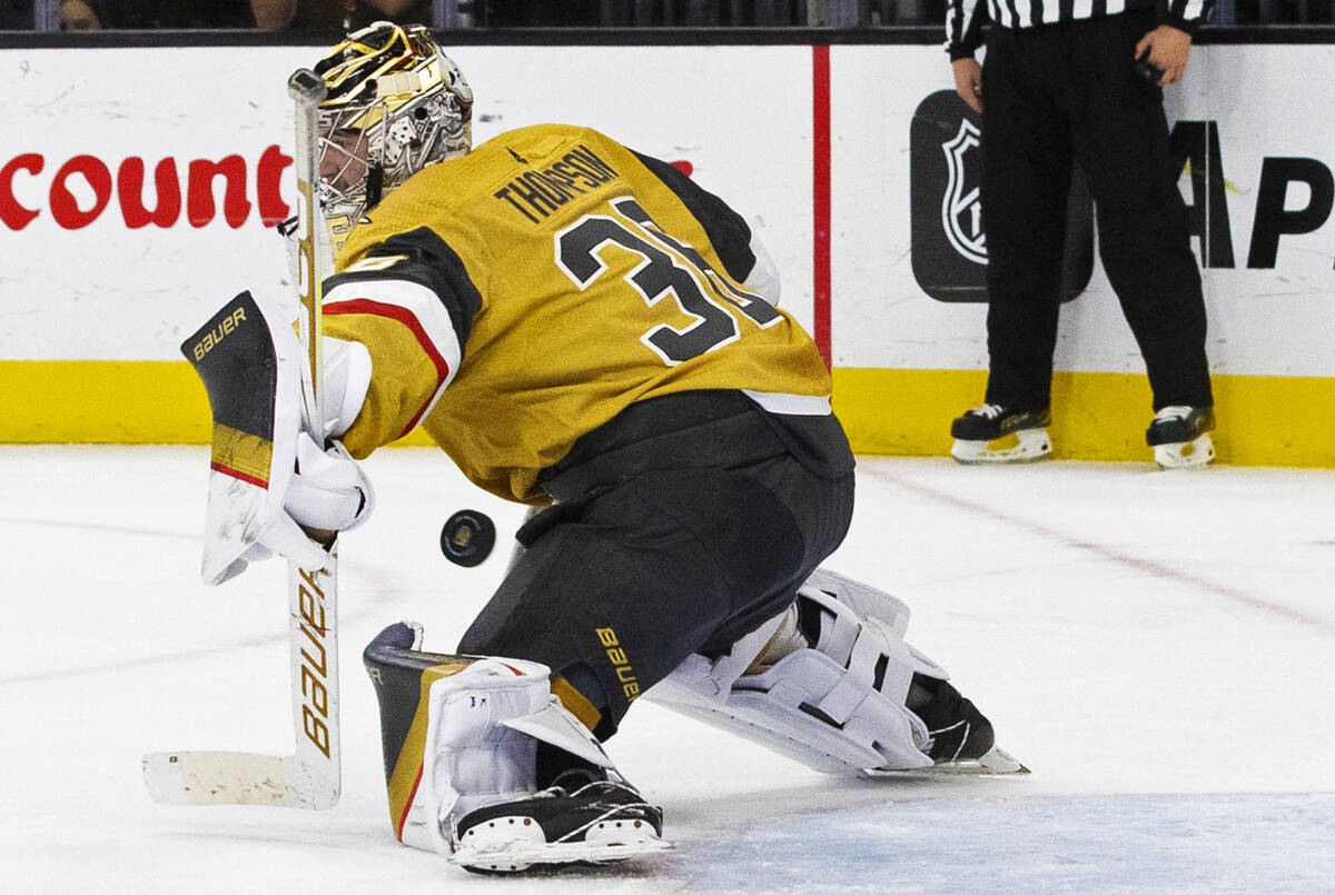 Golden Knights goaltender Logan Thompson (36) makes a save in the second period during an NHL h ...