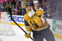 Vegas Golden Knights defenseman Shea Theodore (27) reacts after scoring in overtime against the ...