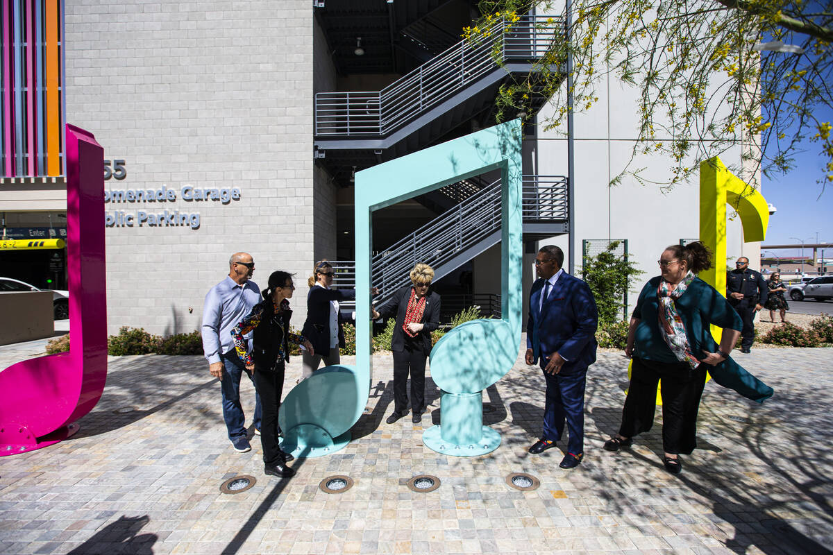 Las Vegas Mayor Carolyn Goodman, center, checks out the "Larger Than Life" public art ...