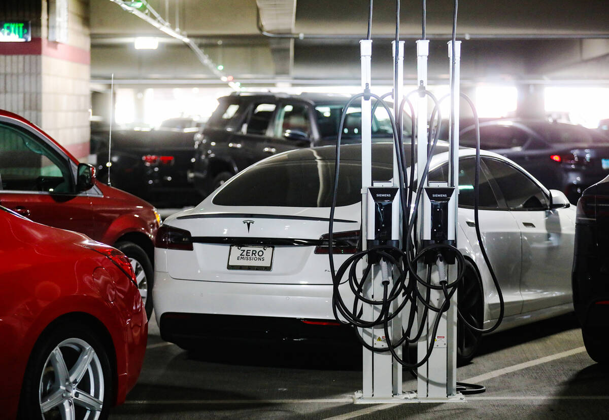 One of the new electric vehicle charging stations at Harry Reid International Airport in Las Ve ...