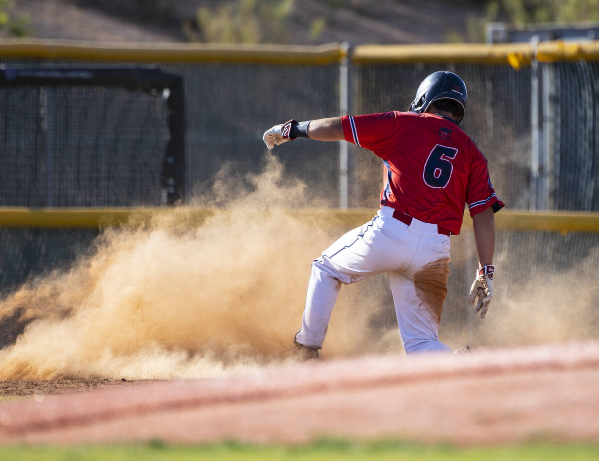 Coronado High’s outfielder Preston Joncich (6) slides at third during a boys high school ...