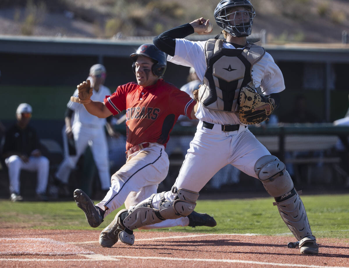 Palo High’s catcher Brady Dallimore throws to first for a double play as Coronado High&# ...