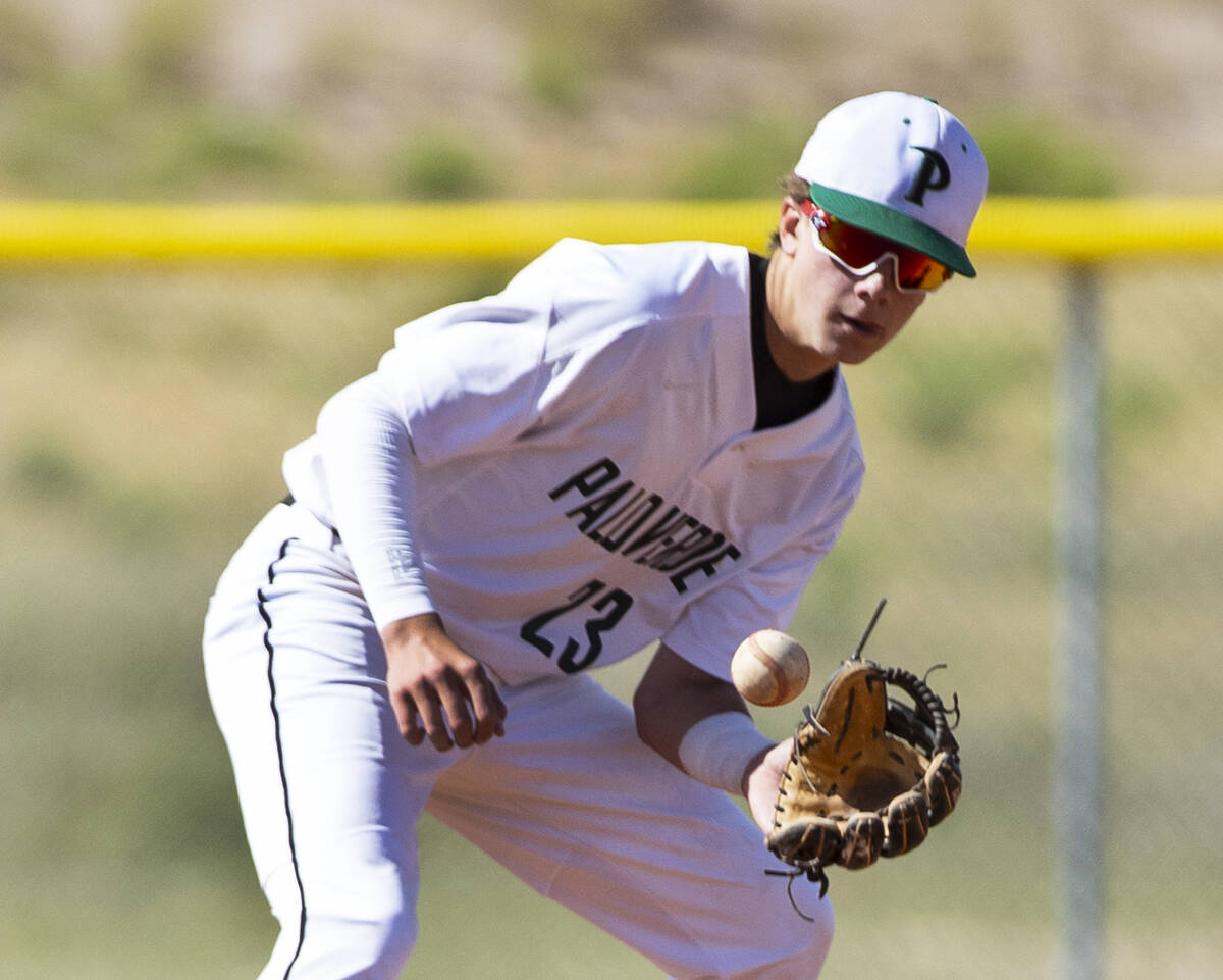 Palo High’s shortstop Ethan Clauss (23) catches the ball during the second innings of a boys ...