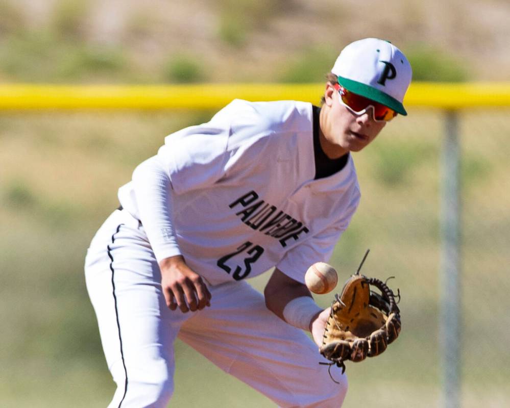 Palo High’s shortstop Ethan Clauss (23) catches the ball during the second innings of a boys ...