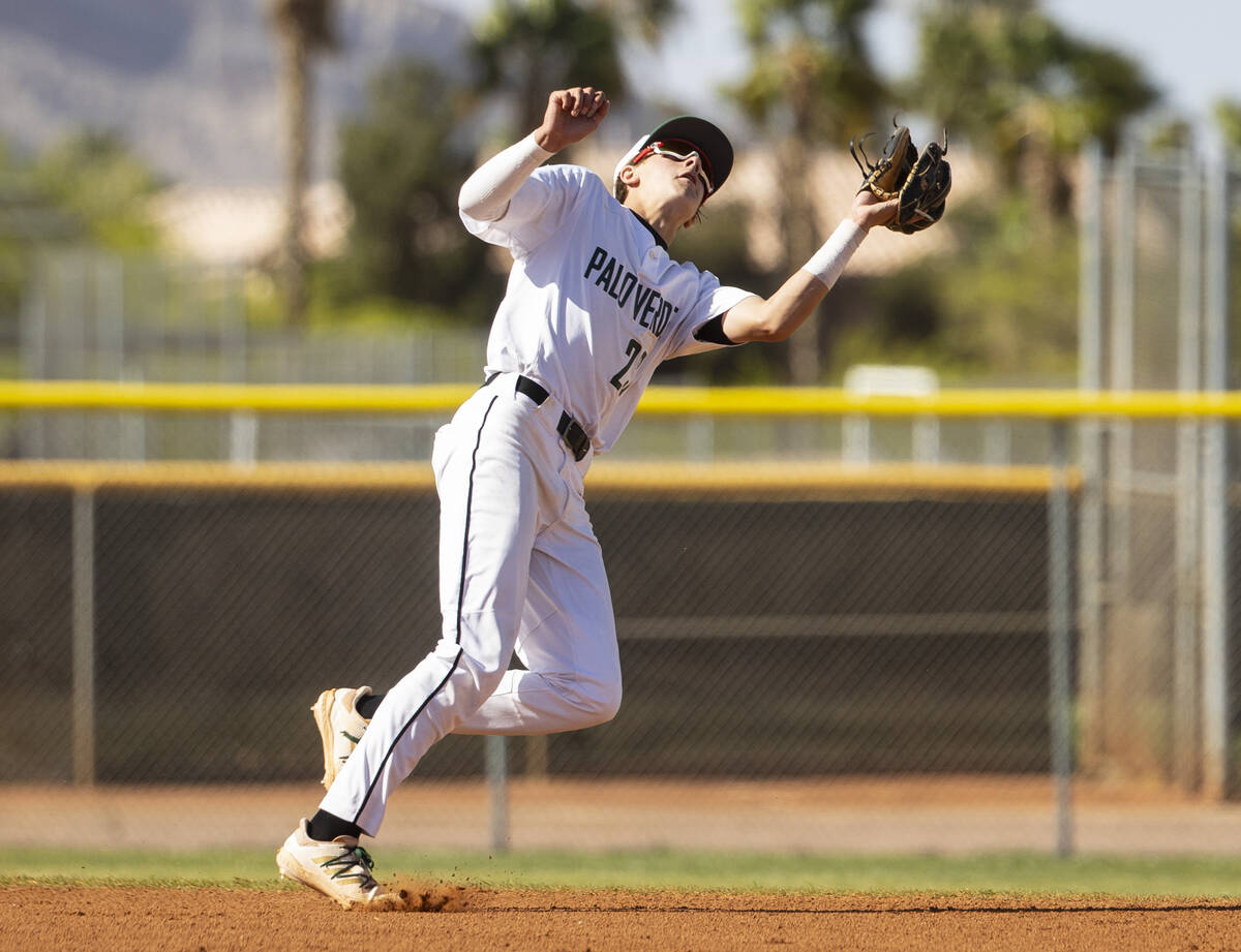 Palo High’s shortstop Ethan Clauss (23) catches the ball during the second innings of a boys ...