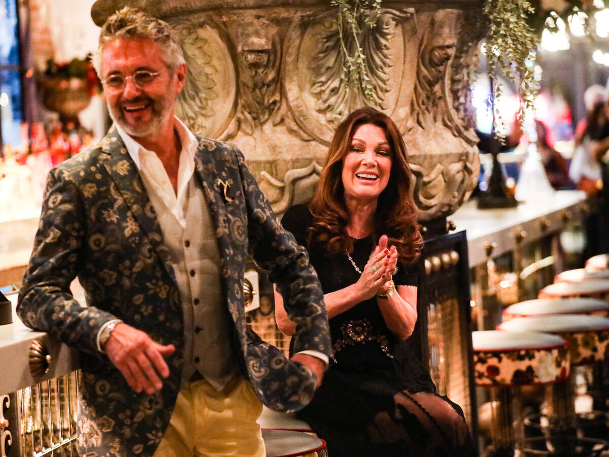Lisa Vanderpump, right, laughs next to her design partner, Nick Alain, left, during a meet-and- ...