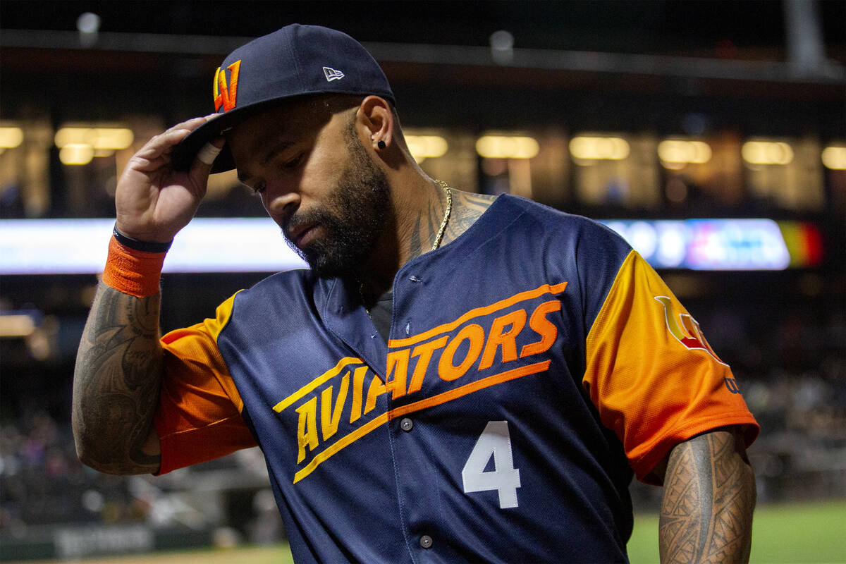 Las Vegas Aviators first baseman Eric Thames (4) heads for the dugout during a Minor League Bas ...