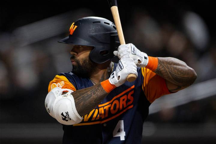 Las Vegas Aviators slugger Eric Thames (4) bats against the El Paso Chihuahuas during a Minor L ...