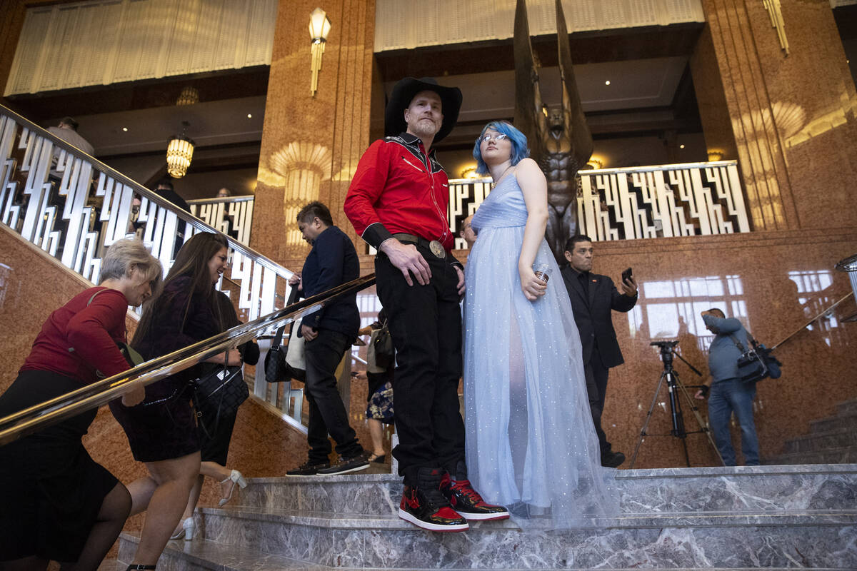 Arbor View High School teacher Steve LaDouceur, left, with his daughter aRea, 16, attend the He ...