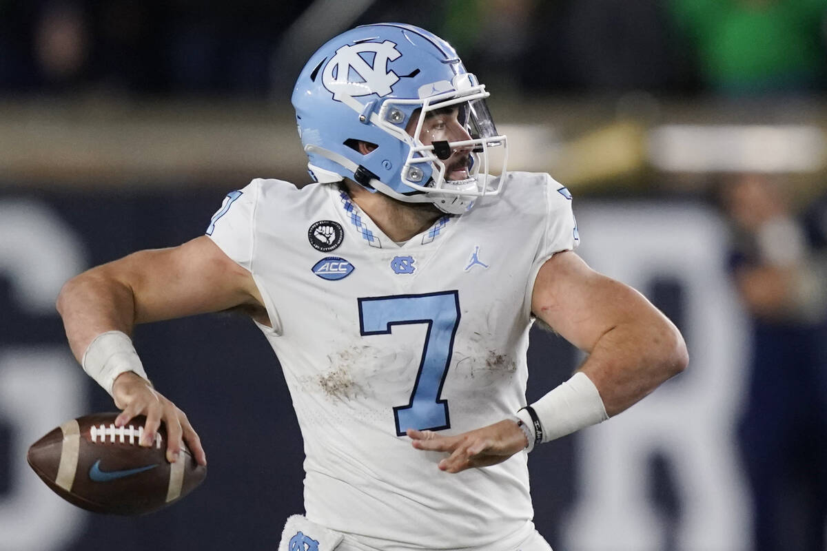 North Carolina quarterback Sam Howell throws during the second half of an NCAA college football ...