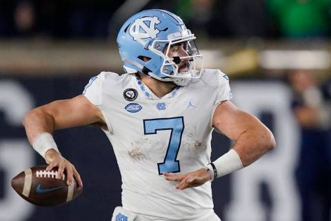 North Carolina quarterback Sam Howell throws during the second half of an NCAA college football ...