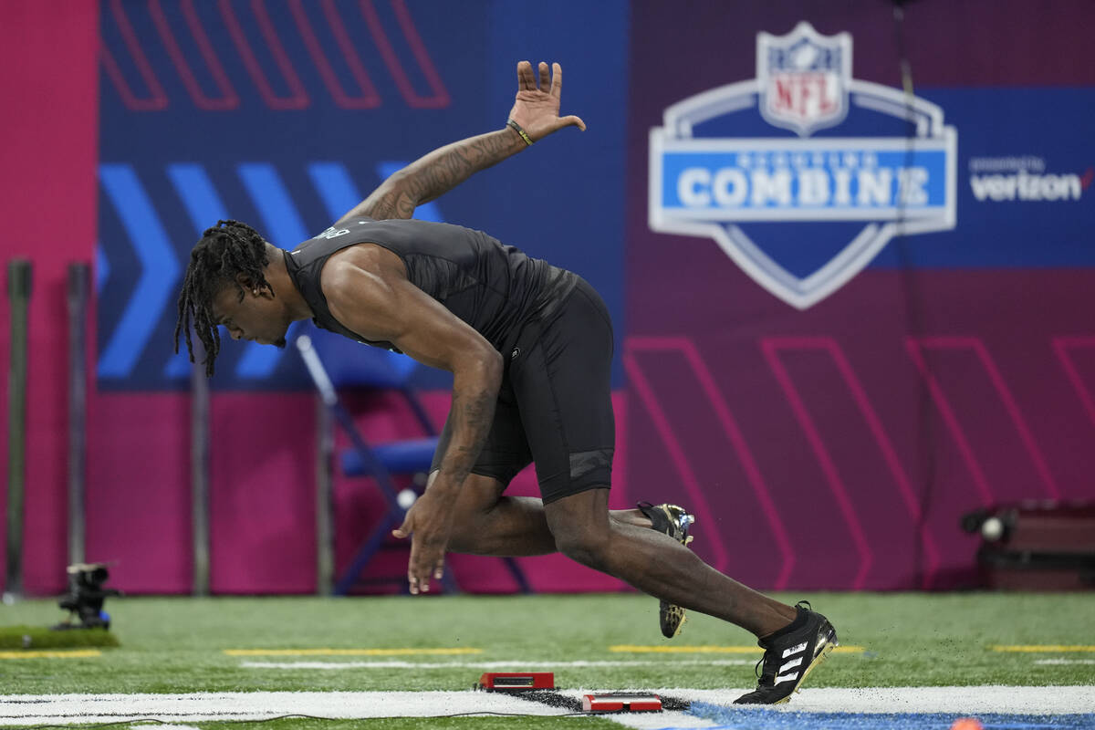 Baylor defensive back Kalon Barnes runs the 40-yard dash at the NFL football scouting combine, ...