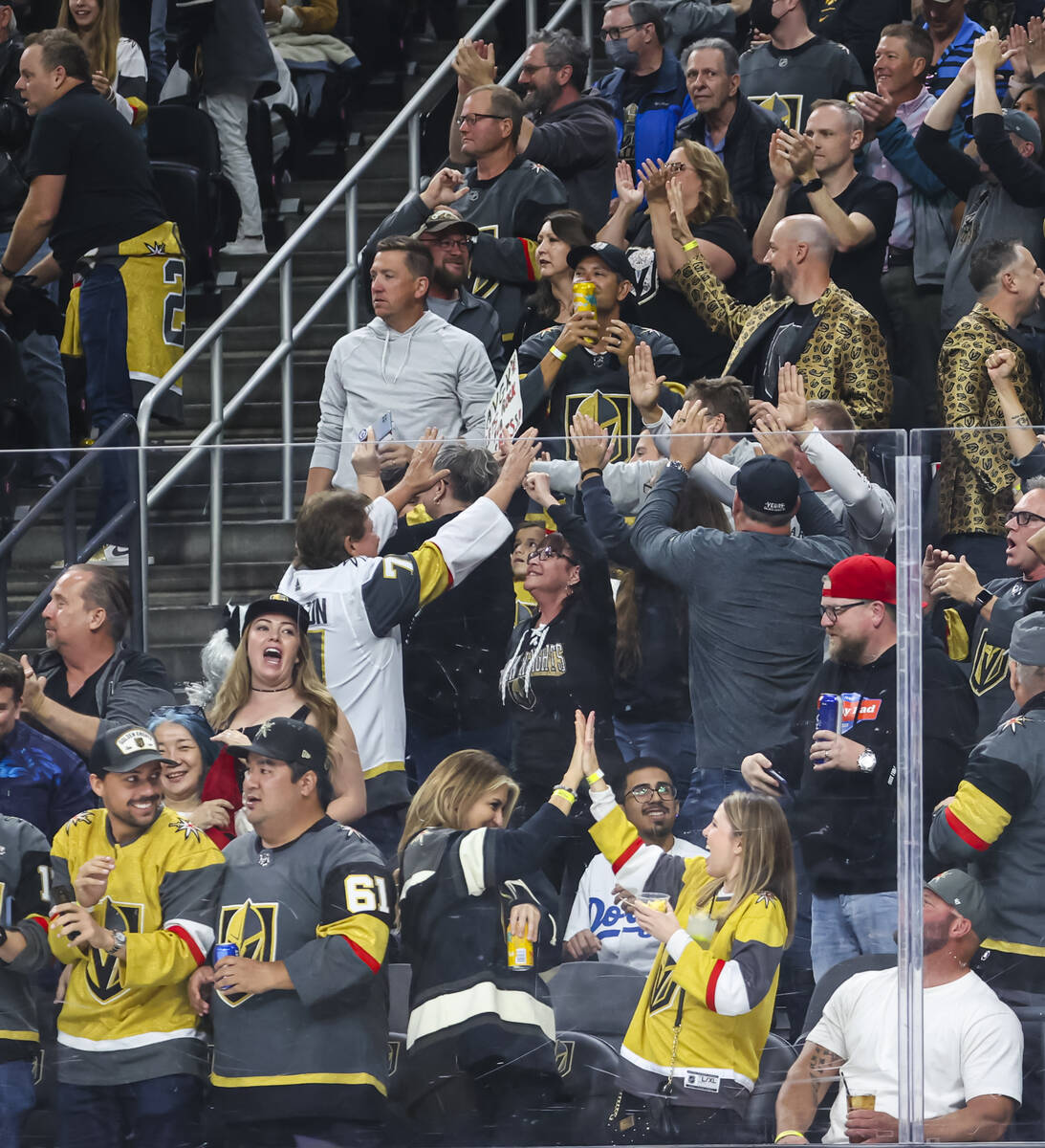 Golden Knights fans celebrate a goal by Golden Knights left wing Max Pacioretty, not pictured, ...