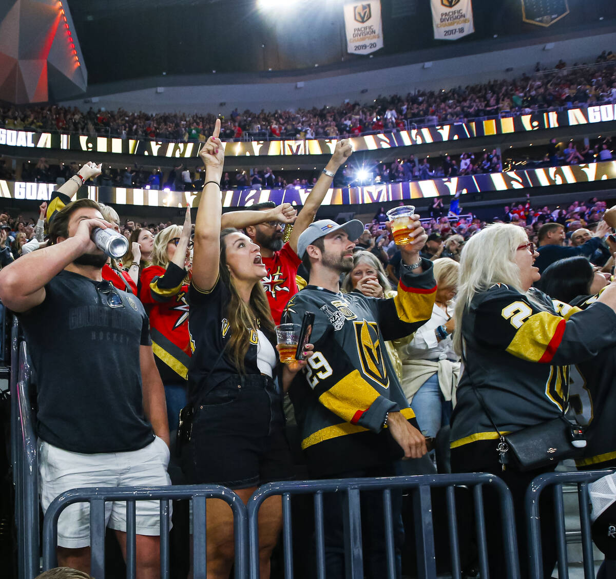 Golden Knights fans celebrate a goal against the San Jose Sharks during the second period of an ...