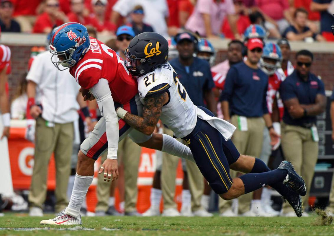 FILE - In this Sept. 21, 2019, file photo, California safety Ashtyn Davis (27) tackles Mississi ...