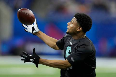 Cincinnati defensive back Coby Bryant participates in a drill at the NFL football scouting comb ...