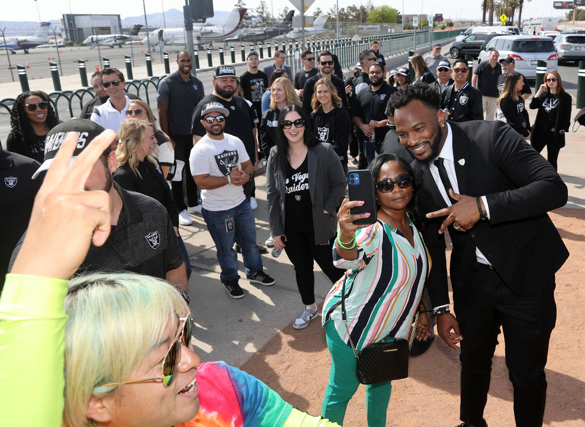 Raiders alumnus Marcel Reece poses with Tionna Ferguson at the Welcome to Fabulous Las Vegas si ...