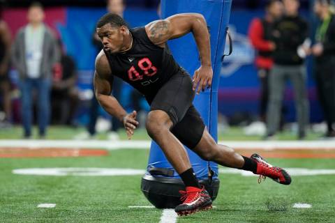 Georgia defensive lineman Travon Walker runs a drill during the NFL football scouting combine, ...