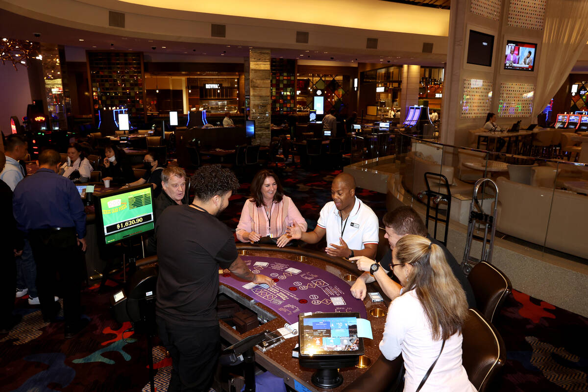 Table games dealers practice at the Palms in Las Vegas Monday, April 25, 2022. The 766-room off ...
