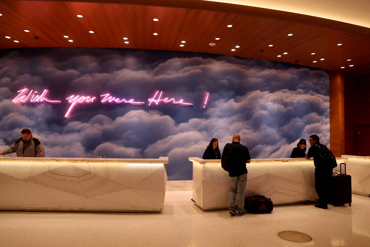 Out of town workers check in at the Palms in Las Vegas Monday, April 25, 2022. The 766-room off ...
