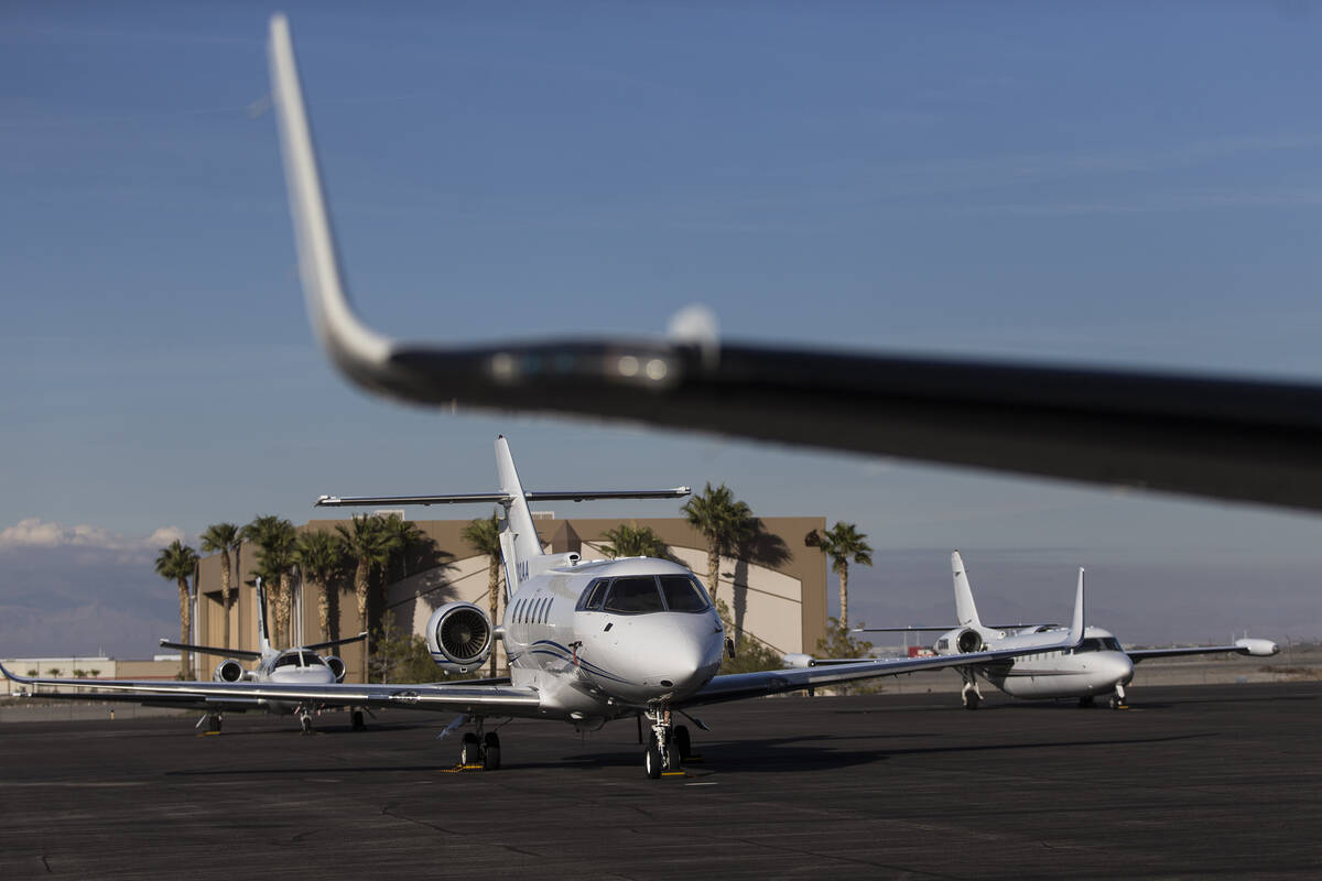 Aircraft line the runway at Henderson Executive Airport on Thursday, Dec. 5, 2019, in Henderson ...