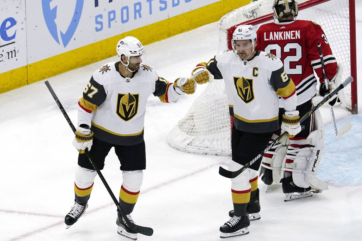 Vegas Golden Knights left wing Max Pacioretty, left, celebrates with right wing Mark Stone afte ...