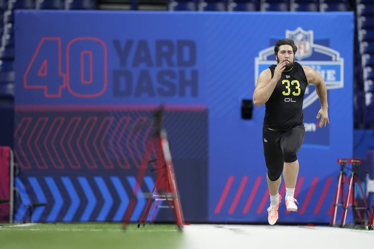 Louisiana-Lafayette offensive lineman Max Mitchell runs the 40-yard dash at the NFL football sc ...