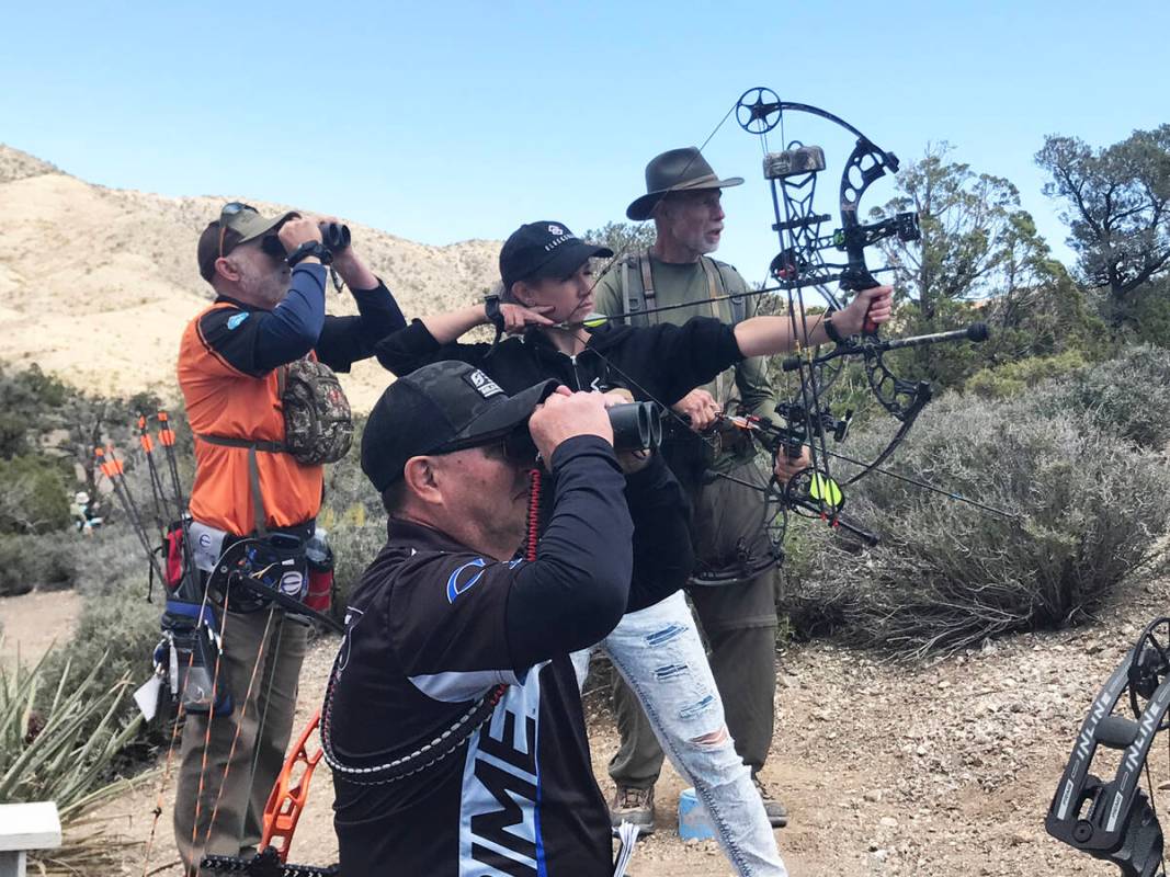 Ashley McDermaid, of Reno, comes to full draw during the Nevada Bow Hunters Association State O ...