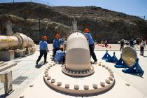 Southern Nevada Water Authority maintenance mechanics install a spacer flange after removing an ...