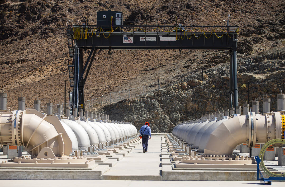 Southern Nevada Water Authority maintenance mechanics prepare to remove an energy dissipator be ...