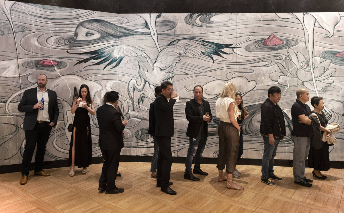 Guests wait in line at Send Noodles during the reopening party at the Palms on Wednesday, April ...