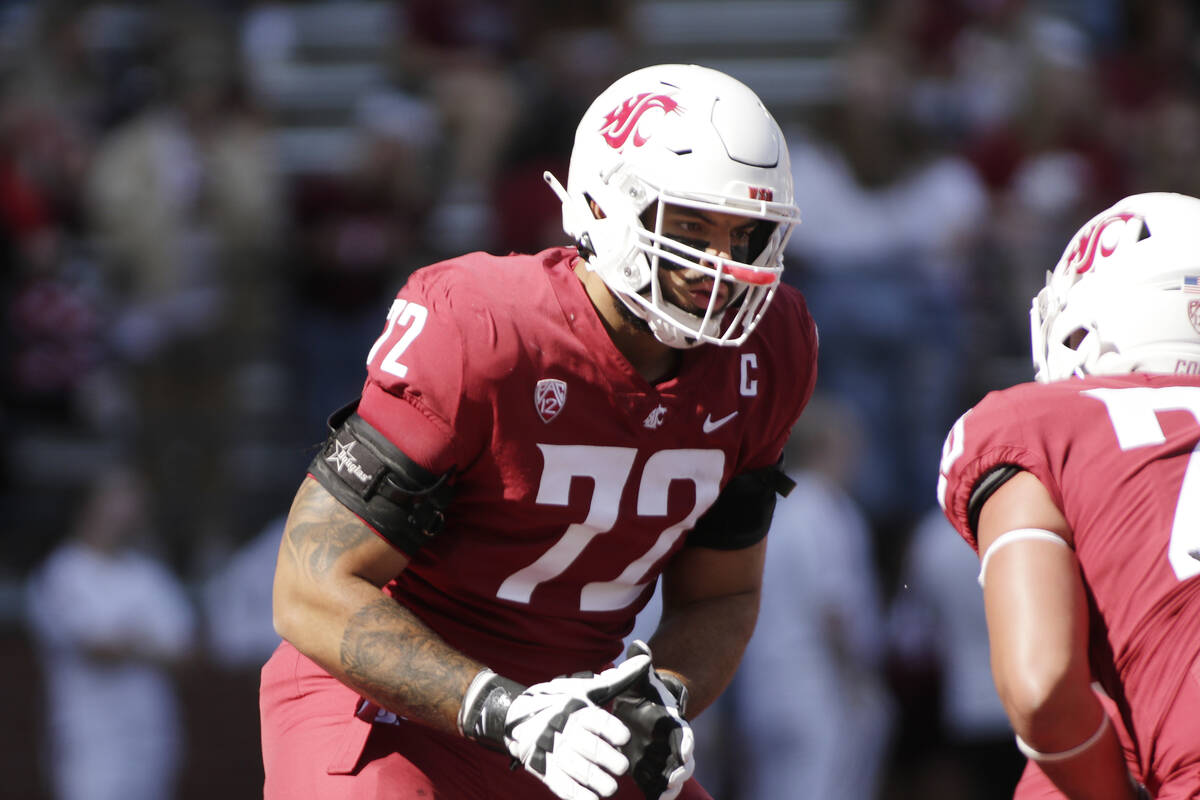 Washington State offensive lineman Abraham Lucas (72) warms up before an NCAA college football ...