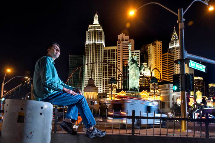 Benny poses for a photo along the Strip from atop a pedestrian bridge near the Excalibur on Fri ...