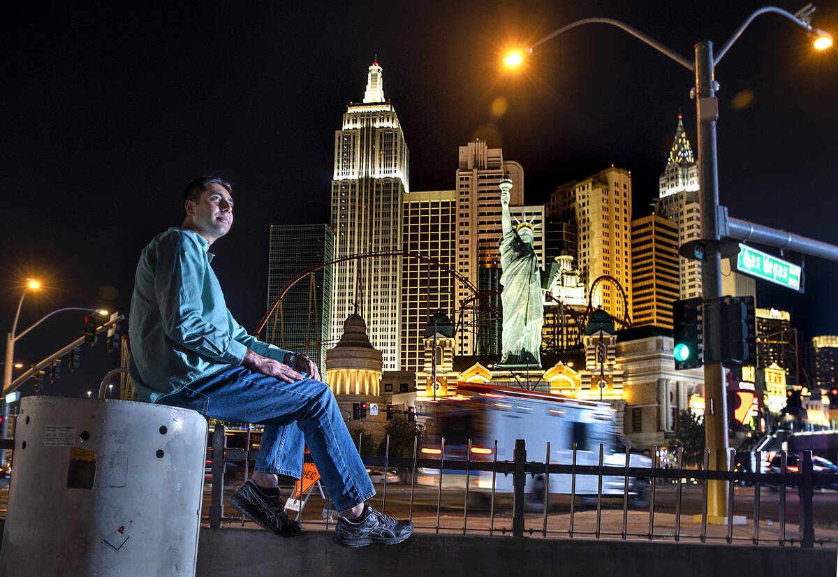 Benny poses for a photo along the Strip from atop a pedestrian bridge near the Excalibur on Fri ...