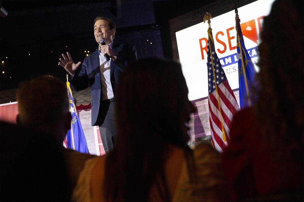 Nevada Republican U.S. Senate candidate Adam Laxalt speaks during a rally with Florida Gov. Ron ...