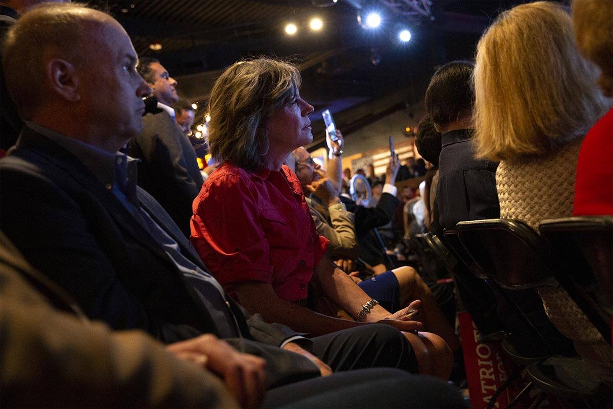 Audience members listen while Nevada Republican U.S. Senate candidate Adam Laxalt speaks during ...