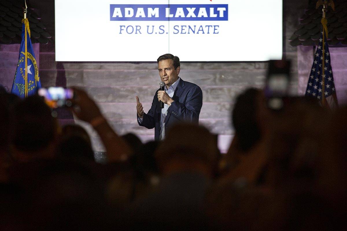 Nevada Republican U.S. Senate candidate Adam Laxalt speaks during a rally with Florida Gov. Ron ...