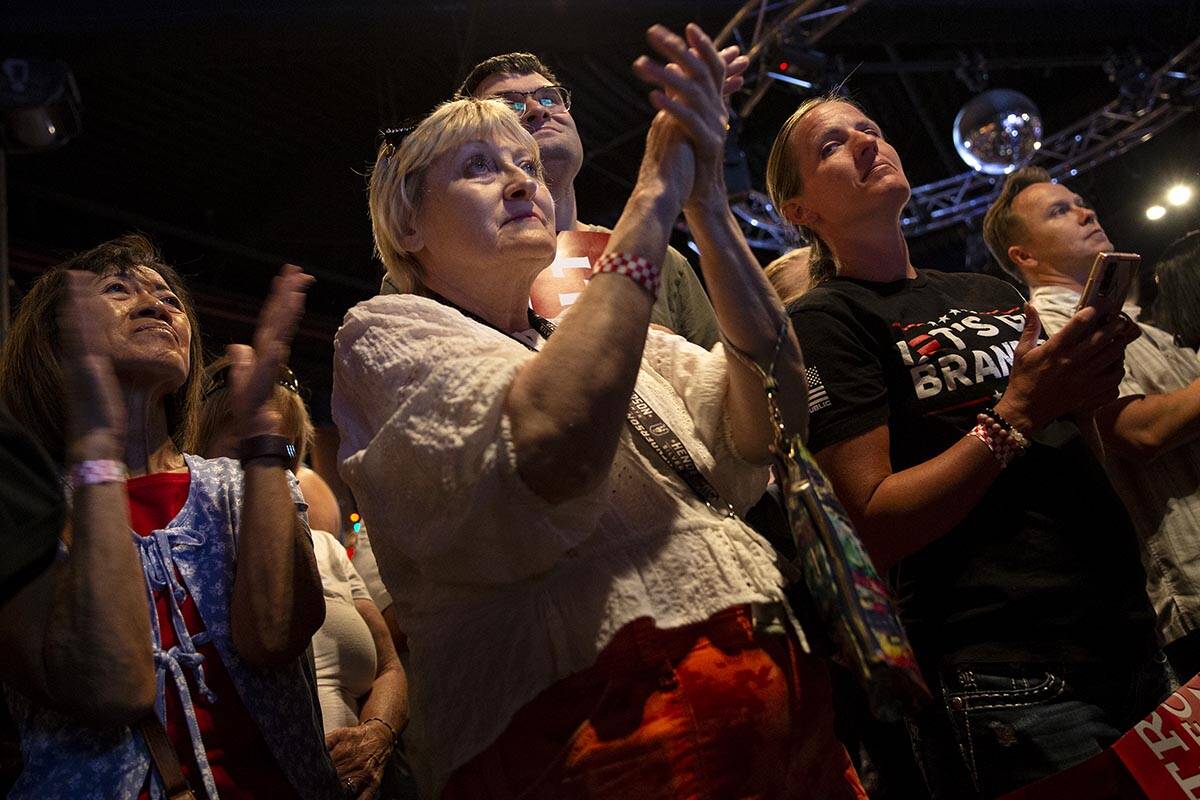 Audience members applaud while Florida Gov. Ron DeSantis speaks during a rally for Nevada Repub ...